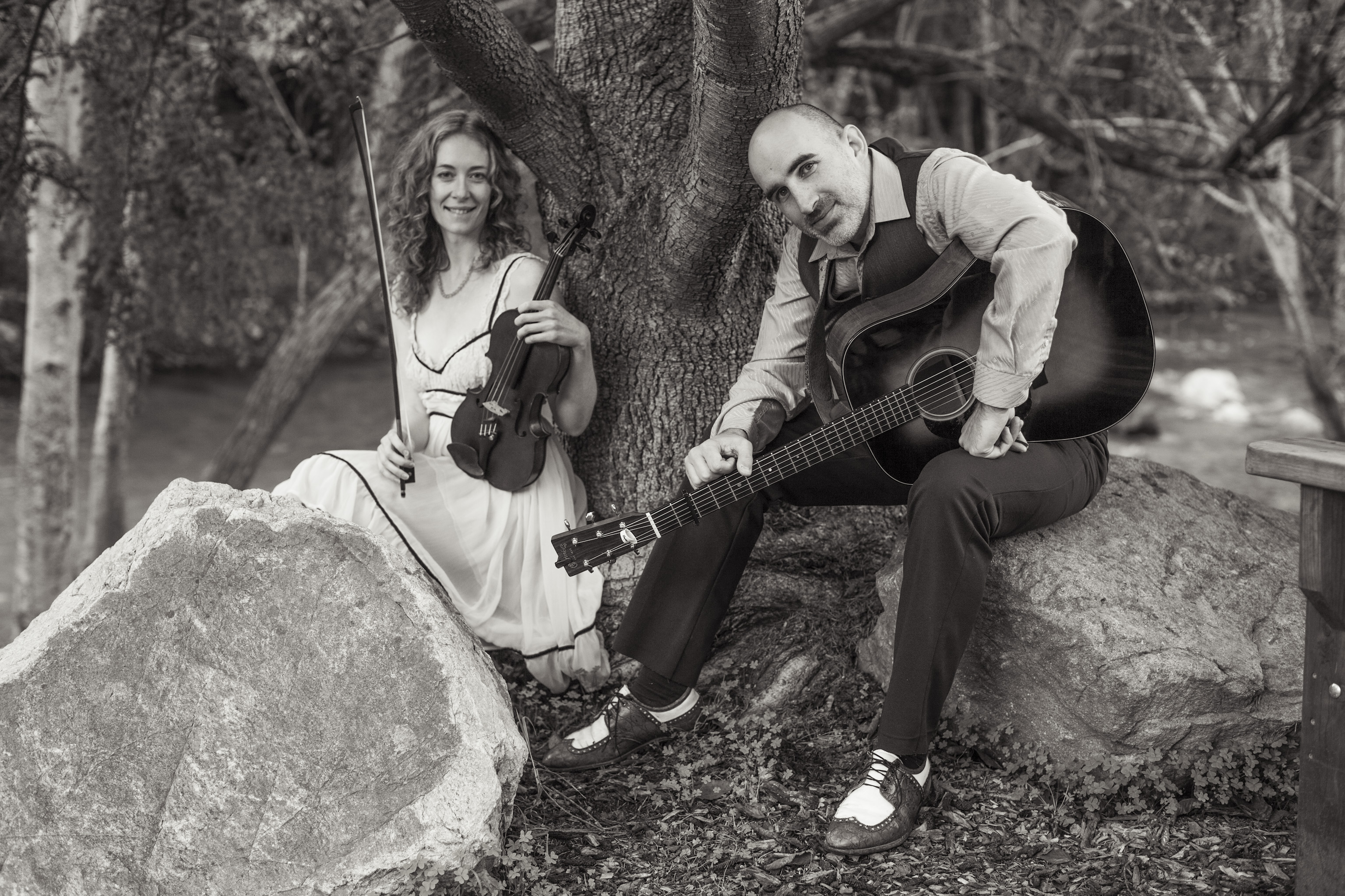 Dan Frechette & Laurel Thomsen posing with their instruments